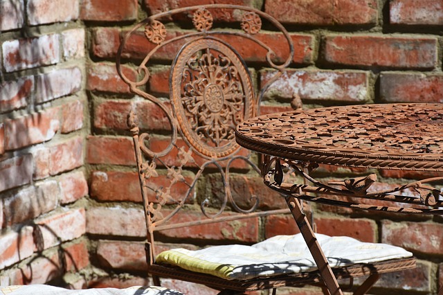 Rusty metallic chair and table.