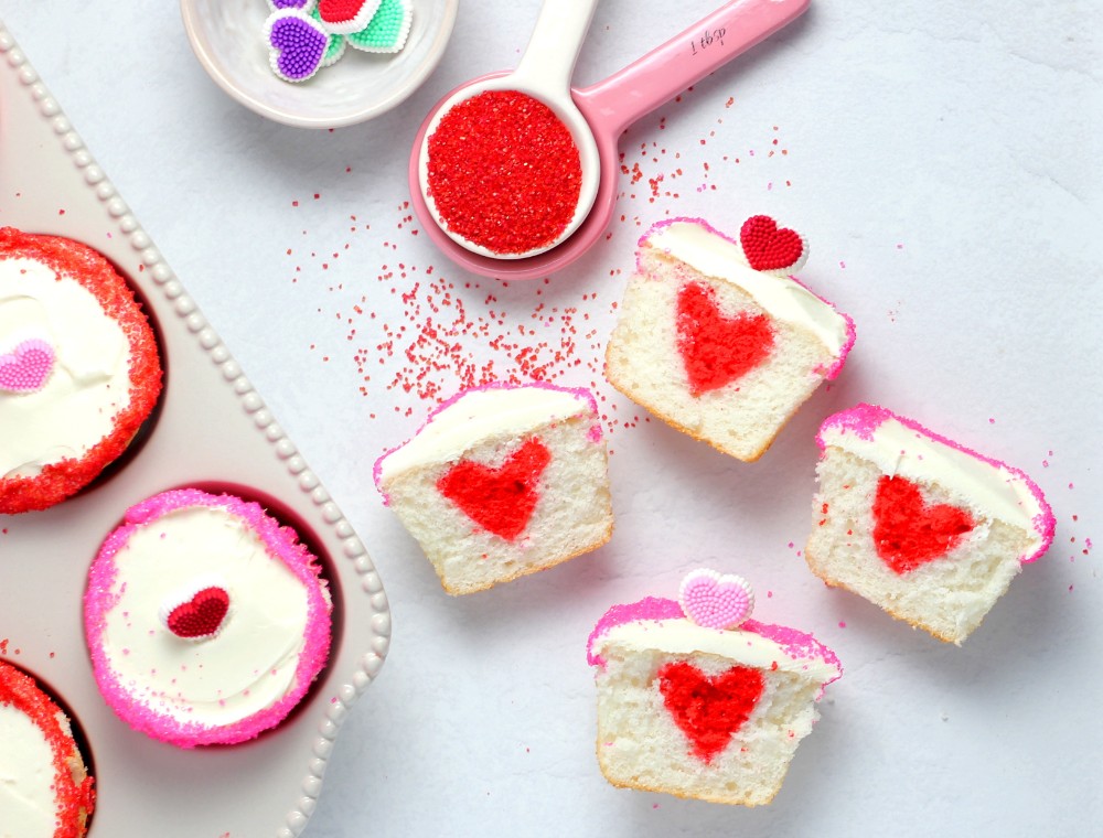 Delicious Valentine's Day cupcakes topped with red and white sprinkles.