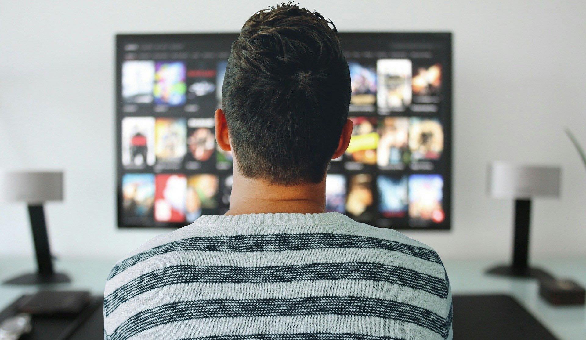 Man looking at a monitor.