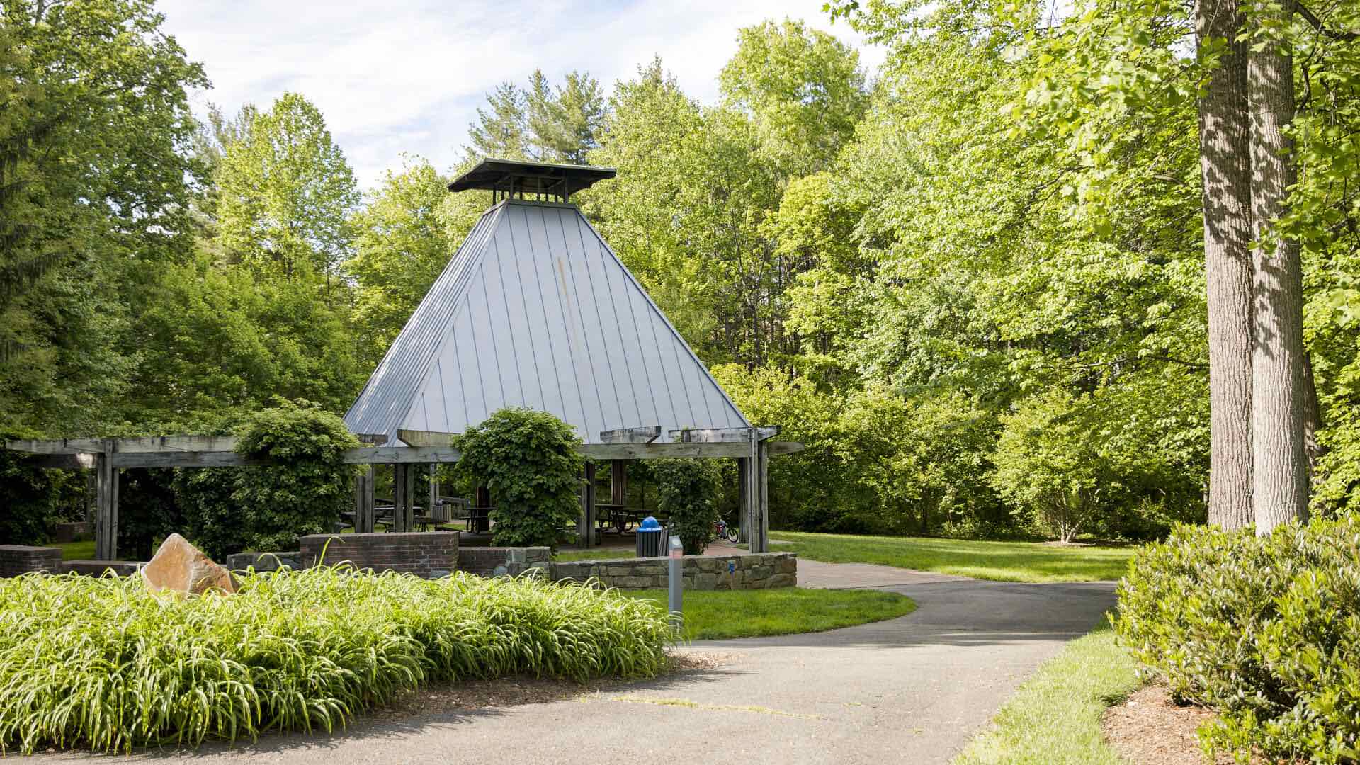 A small building nestled among trees in Reston, VA.