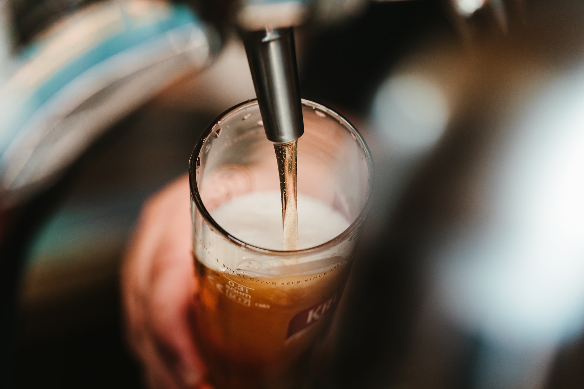 Glass being filled with beer.