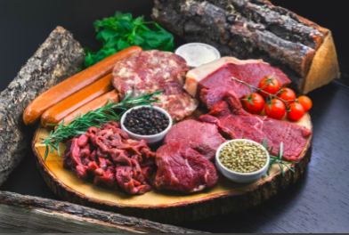 Meaty foods on a plate.