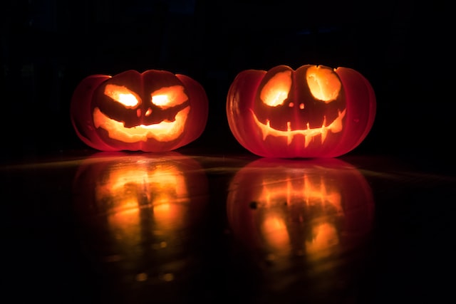 Lighted, carved pumpkins.
