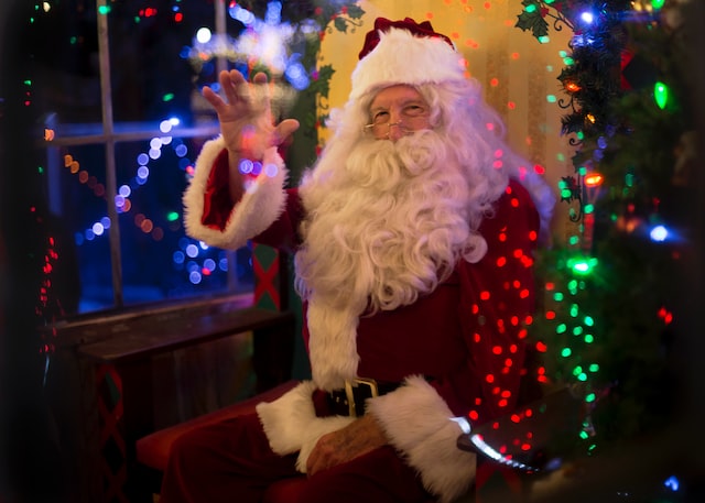 Santa Claus waving.