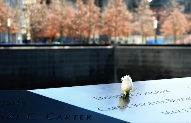 Monument honoring victims of 9/11 attacks with heartfelt epitaph.